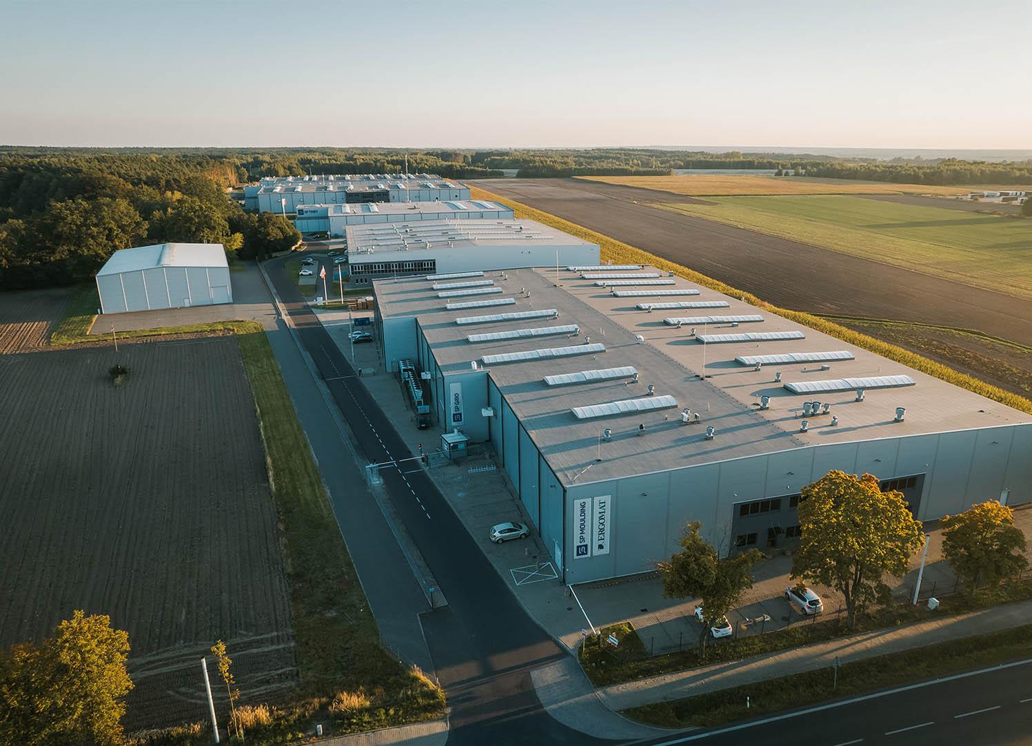 Investor relations team collaborating in the SP Group HQ.